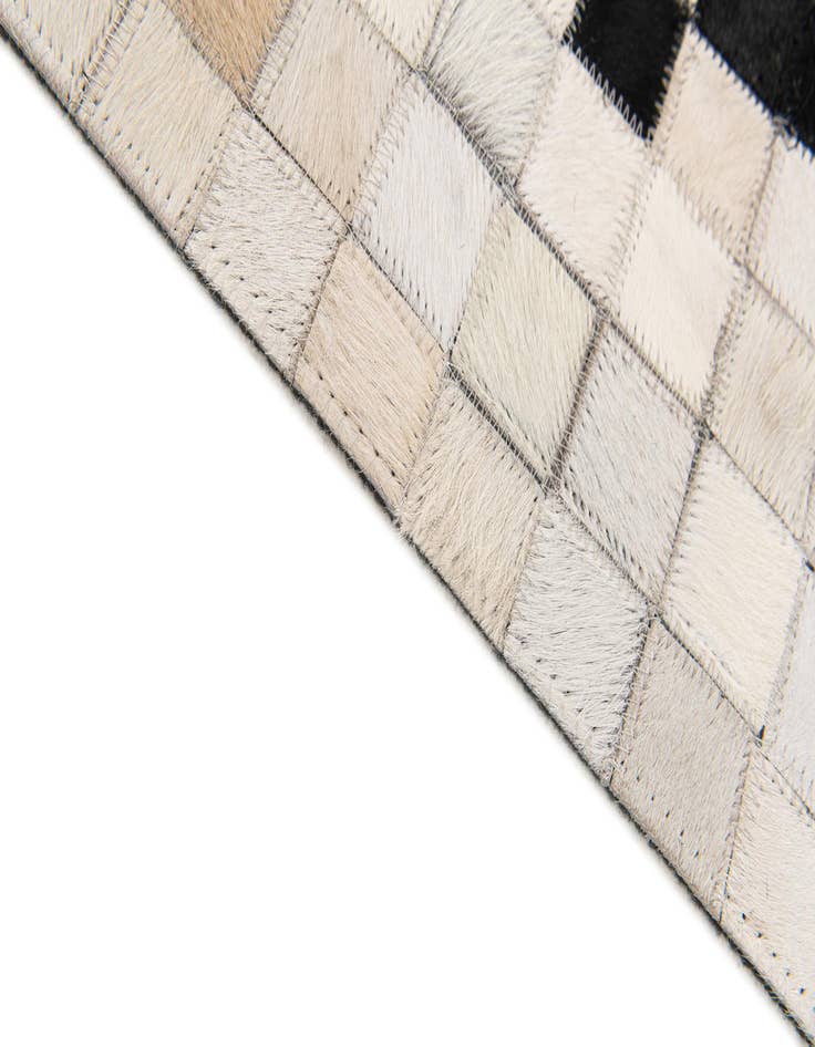 Detail image of  5' 1 x 7' 11 Cowhide Stocks Rug