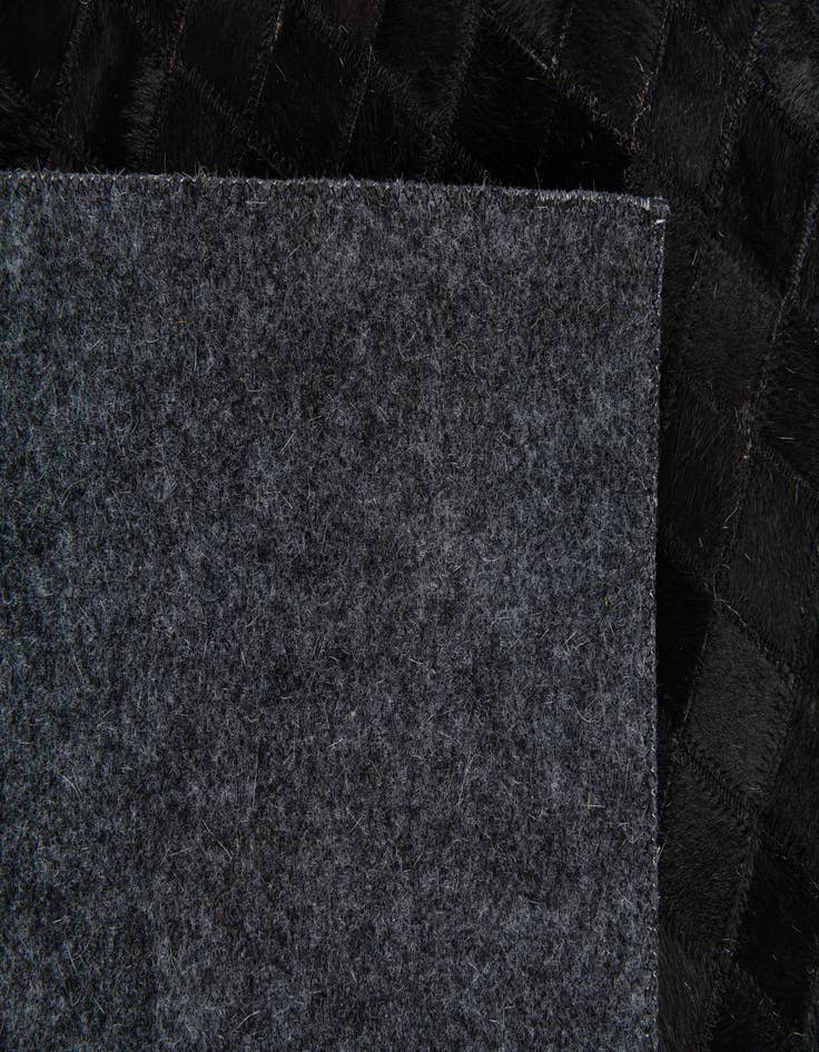 Detail image of  5' 1 x 7' 11 Cowhide Stocks Rug