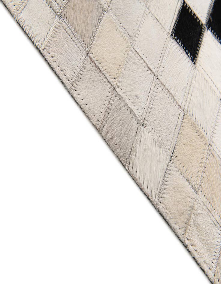 Detail image of  5' 2 x 7' 11 Cowhide Stocks Rug