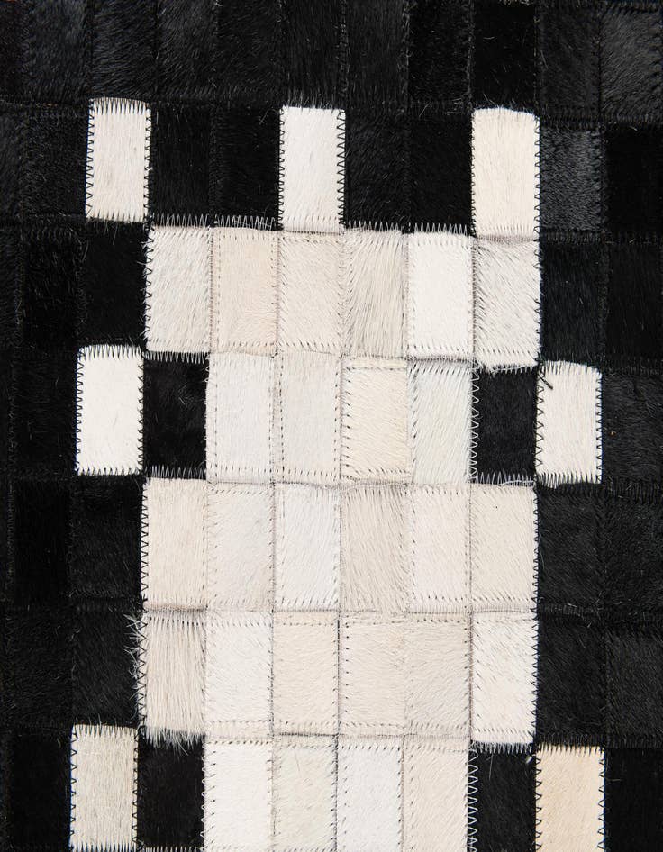 Detail image of  5' 2 x 7' 11 Cowhide Stocks Rug