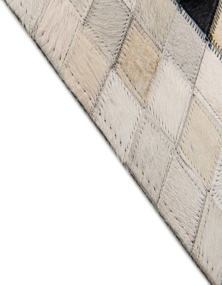 Detail image of  5' 1 x 7' 10 Cowhide Stocks Rug