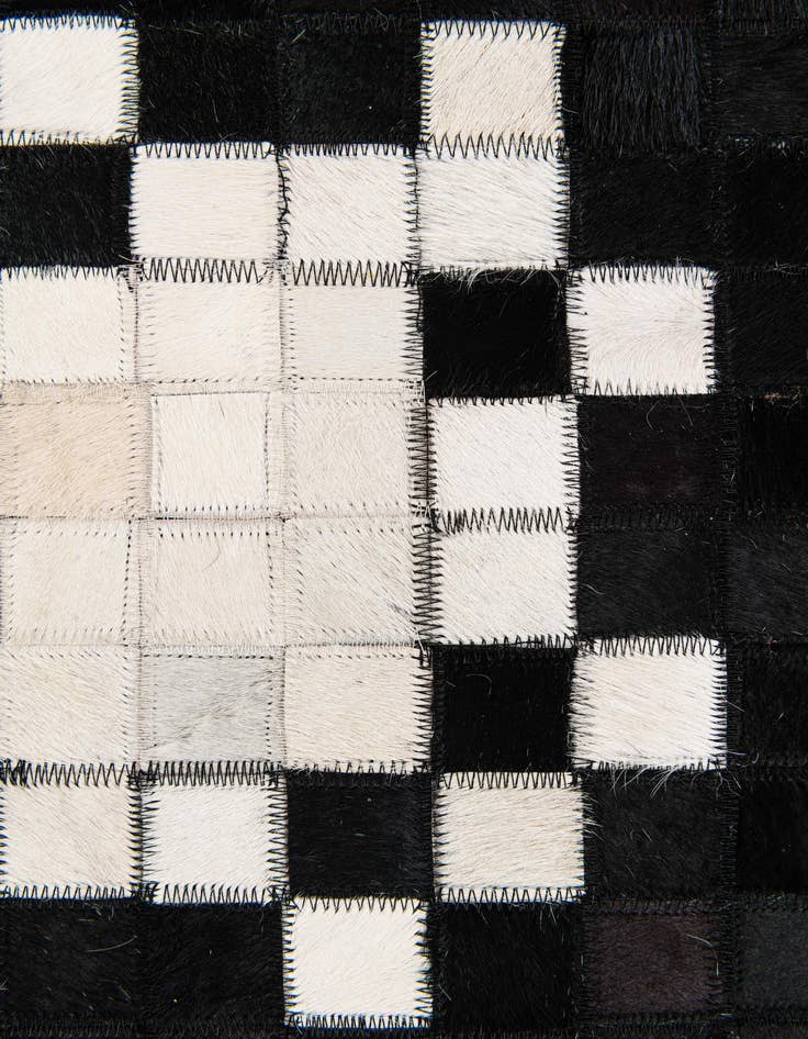 Detail image of  5' 1 x 7' 10 Cowhide Stocks Rug