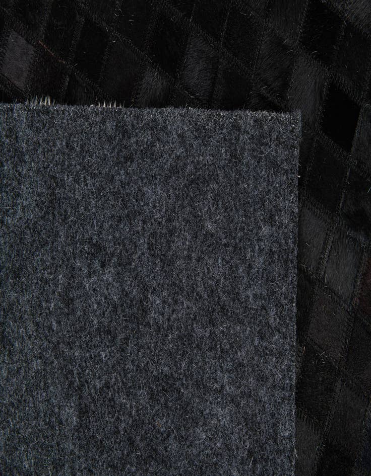 Detail image of  5' 1 x 7' 10 Cowhide Stocks Rug