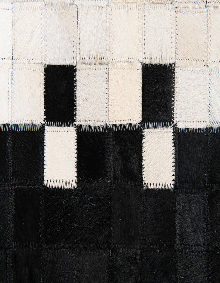 Detail image of  5' x 7' 9 Cowhide Stocks Rug