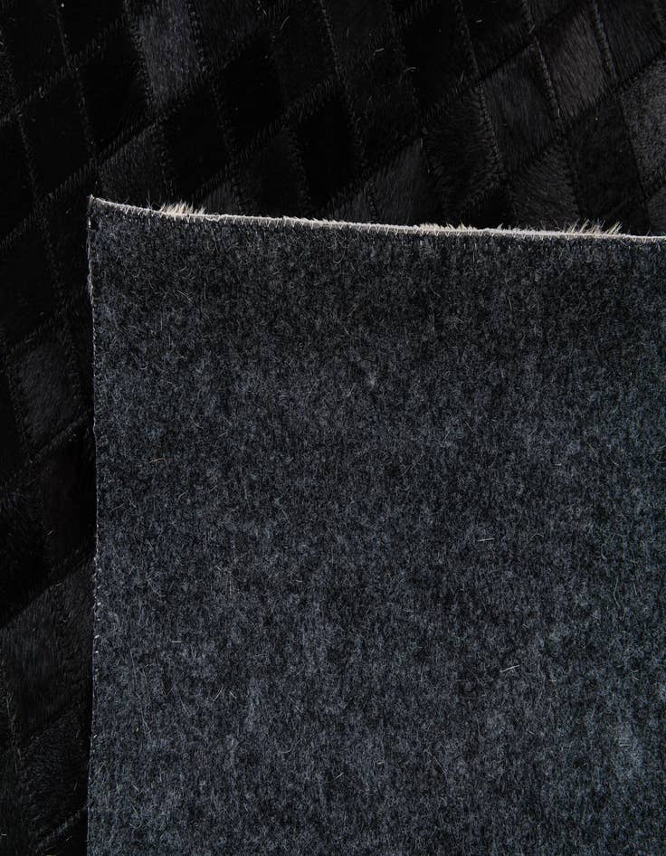 Detail image of  5' x 7' 9 Cowhide Stocks Rug