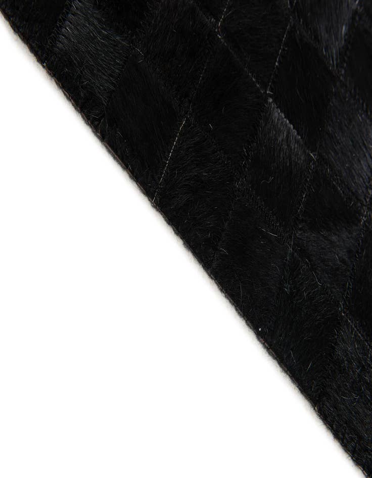 Detail image of  4' 11 x 7' 10 Cowhide Stocks Rug