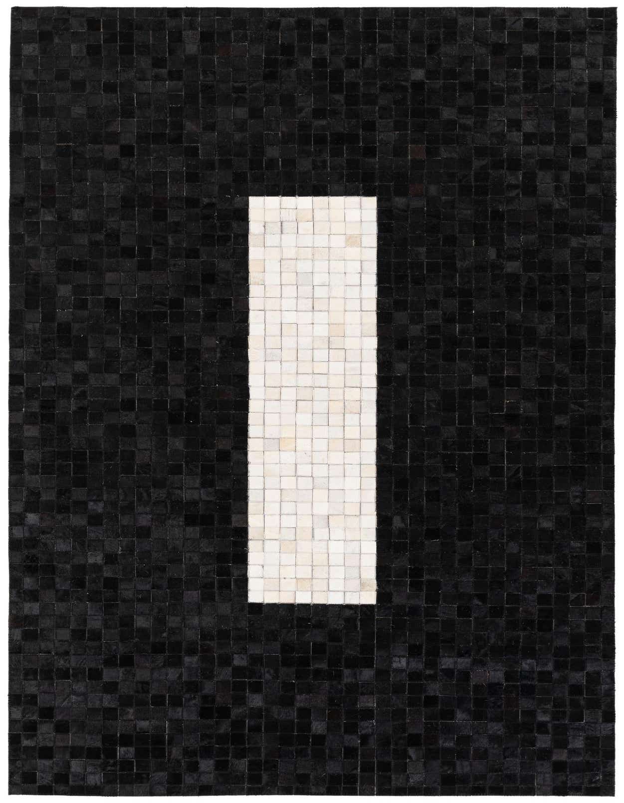 A modern 5x8 rectangular rug with a black cowhide background and a central vertical white stripe.