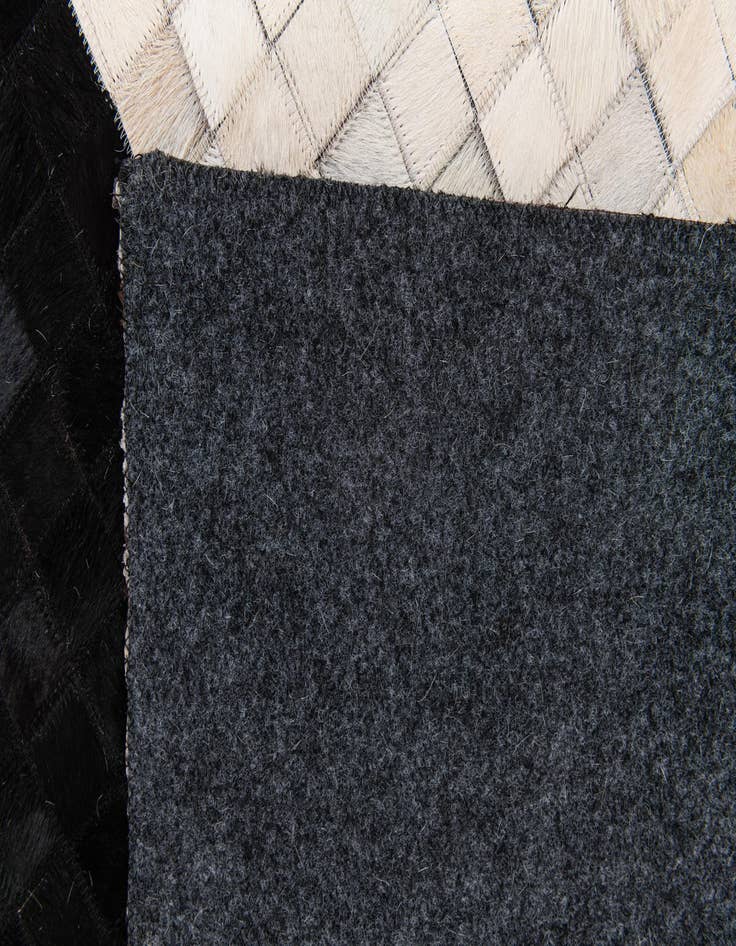 Detail image of  5' x 8' Cowhide Stocks Rug