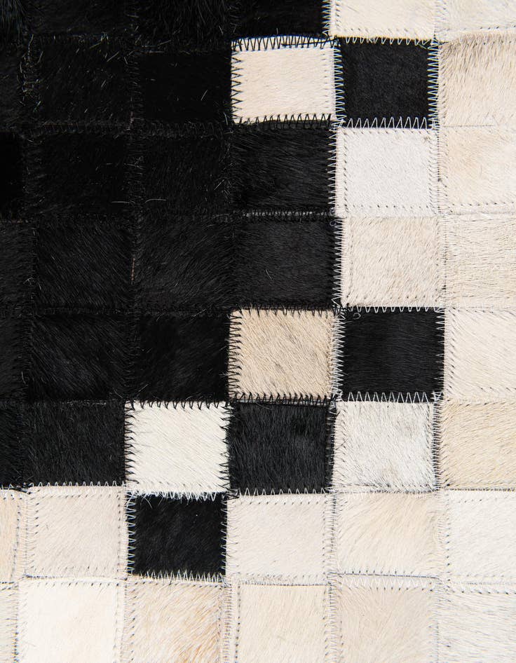 Detail image of  4' 10 x 7' 9 Cowhide Stocks Rug