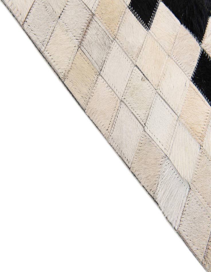 Detail image of  5' x 7' 10 Cowhide Stocks Rug