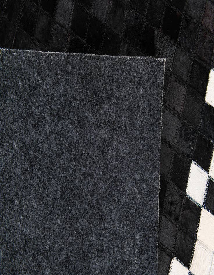 Detail image of  5' x 7' 10 Cowhide Stocks Rug