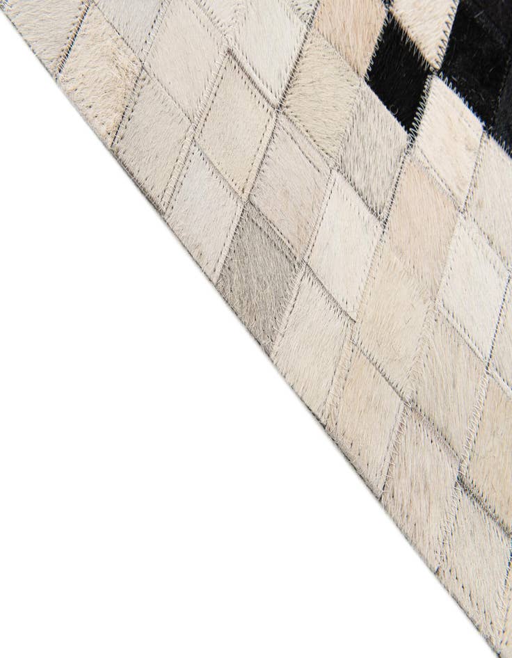 Detail image of  4' 11 x 7' 10 Cowhide Stocks Rug