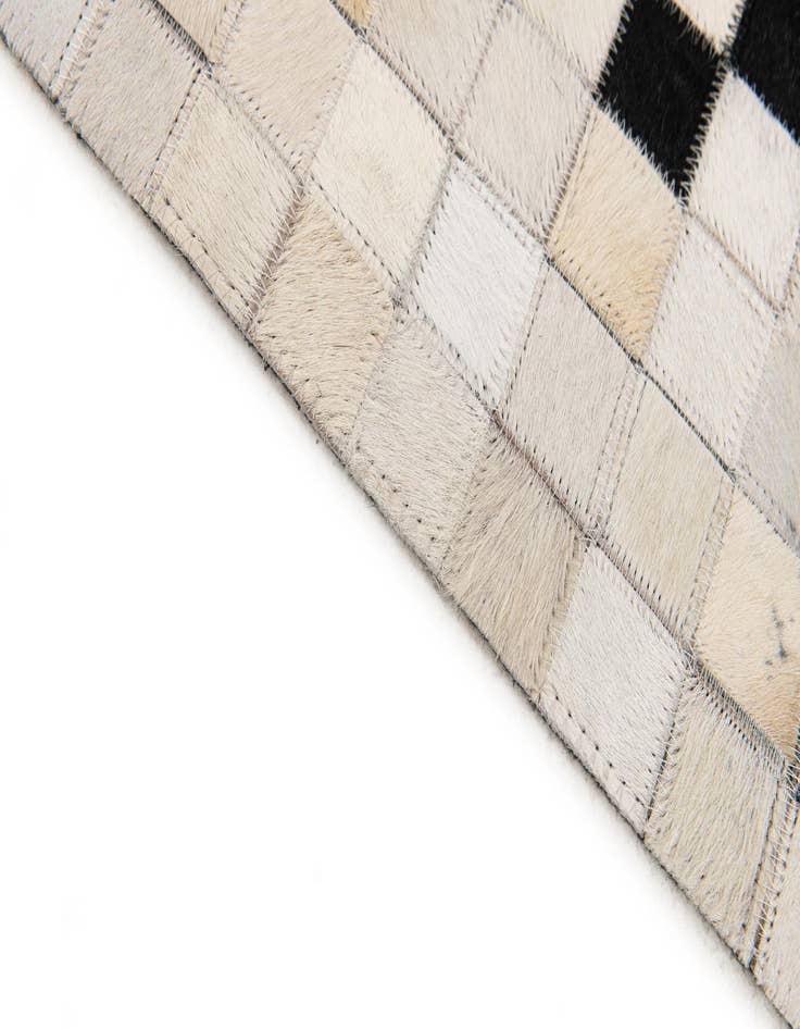 Detail image of  5' 1 x 7' 9 Cowhide Stocks Rug