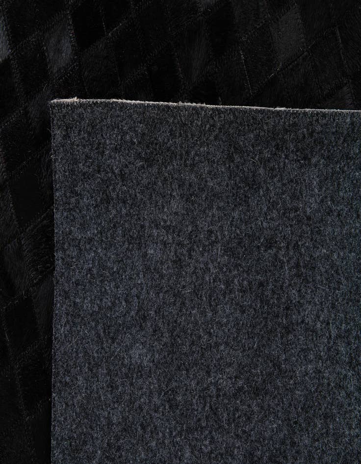 Detail image of  5' 1 x 7' 9 Cowhide Stocks Rug