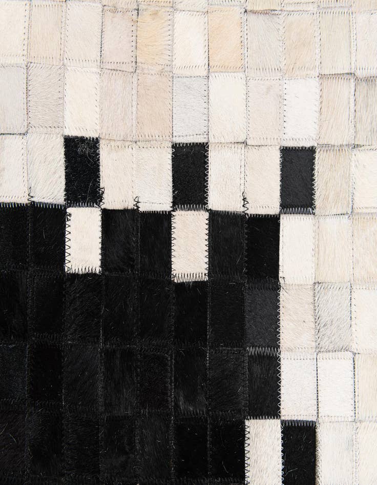 Detail image of  4' 11 x 7' 10 Cowhide Stocks Rug