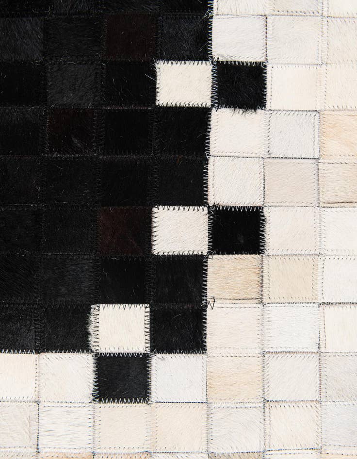 Detail image of  5' 1 x 7' 10 Cowhide Stocks Rug