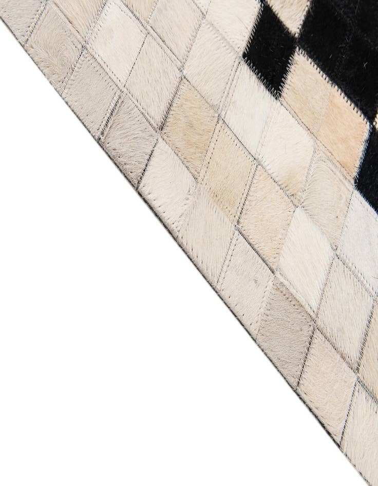 Detail image of  5' 1 x 7' 10 Cowhide Stocks Rug
