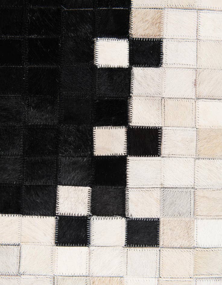 Detail image of  5' 1 x 7' 10 Cowhide Stocks Rug