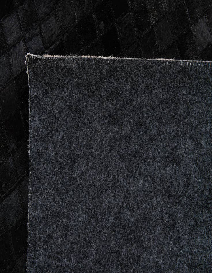 Detail image of  5' 1 x 7' 10 Cowhide Stocks Rug