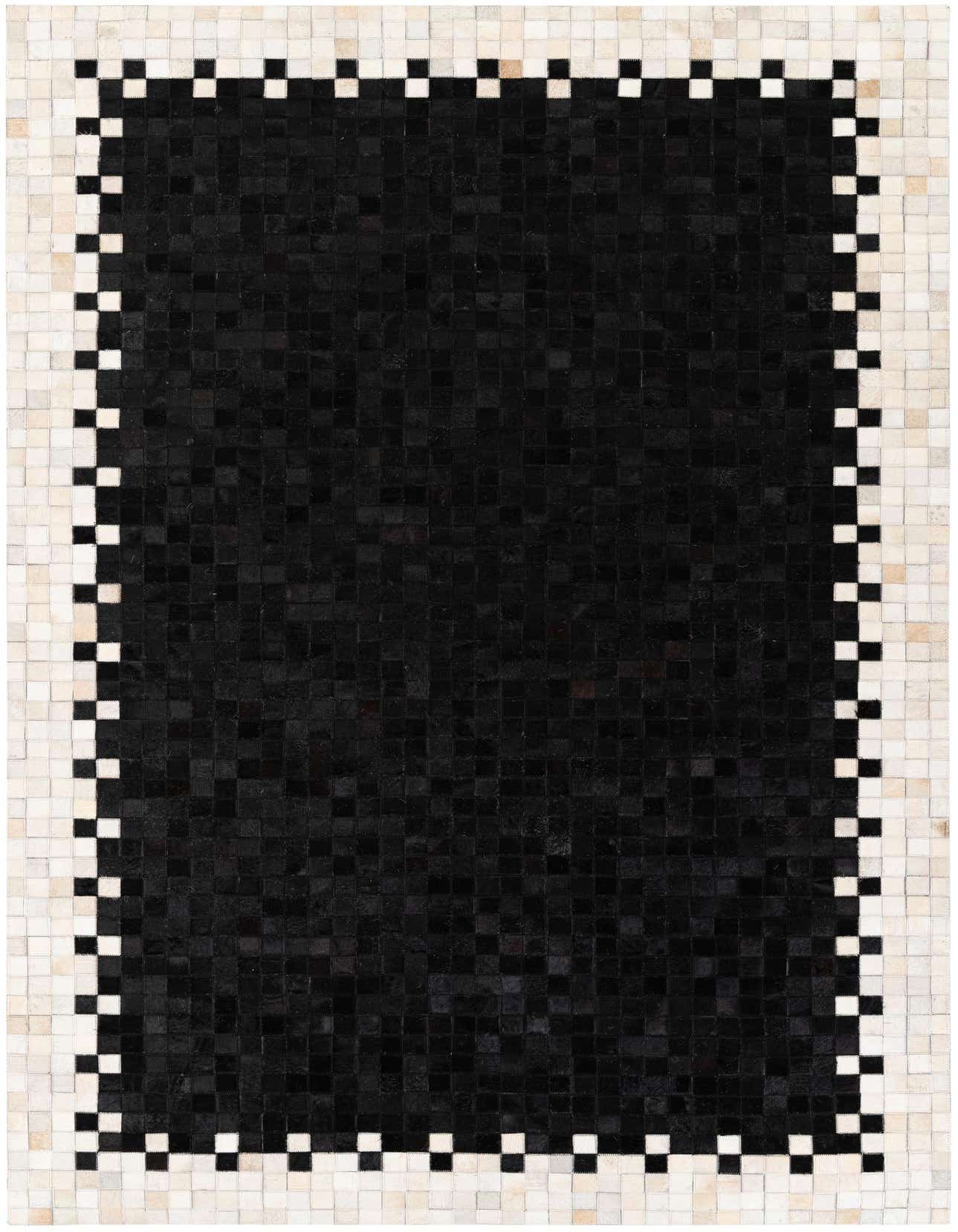 A 5x8 rectangular black patchwork cowhide rug with a geometric border of alternating black and white squares.