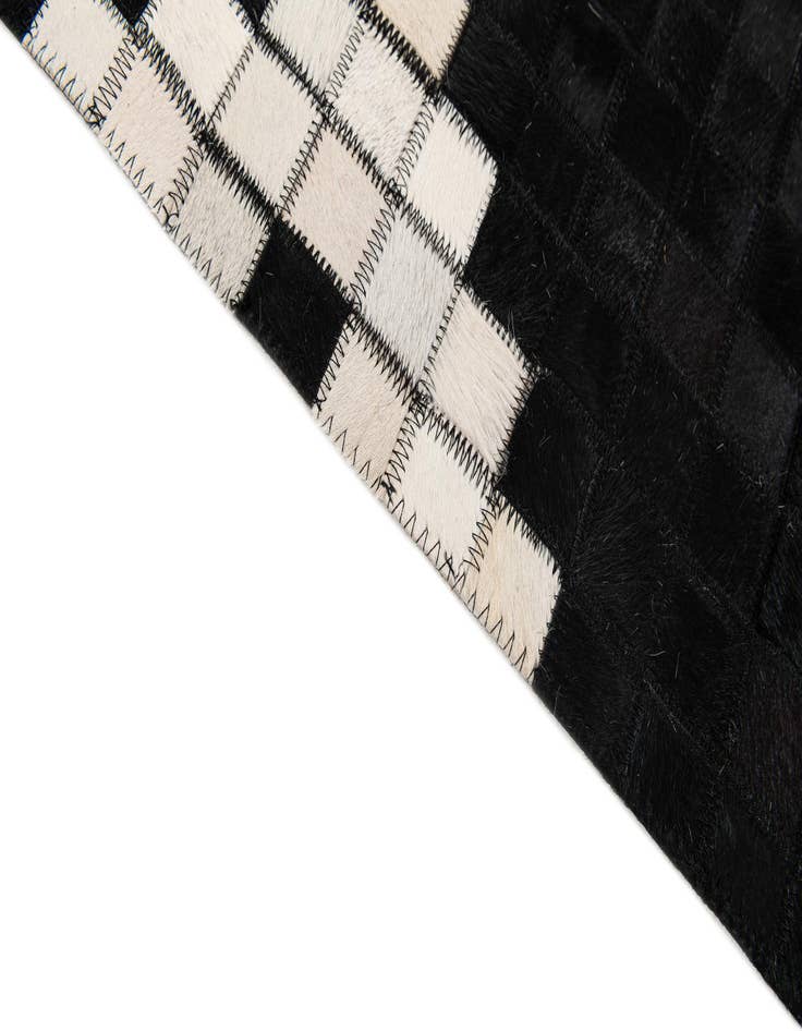 Detail image of  5' 2 x 7' 11 Cowhide Stocks Rug