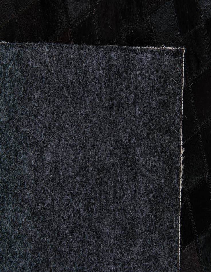 Detail image of  5' 2 x 7' 11 Cowhide Stocks Rug