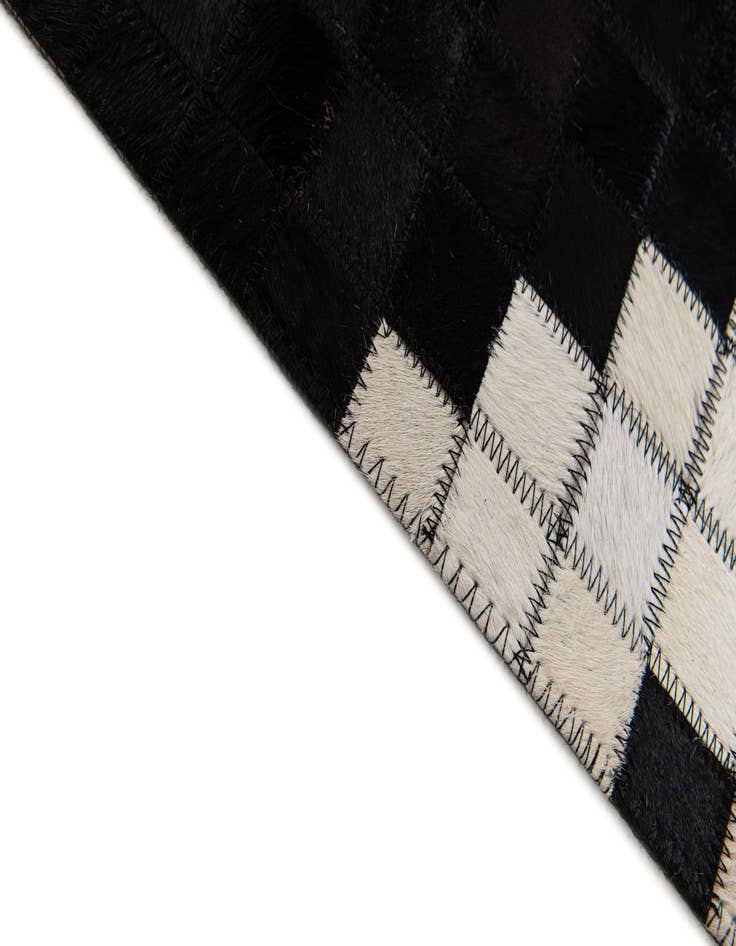 Detail image of  5' 1 x 7' 11 Cowhide Stocks Rug