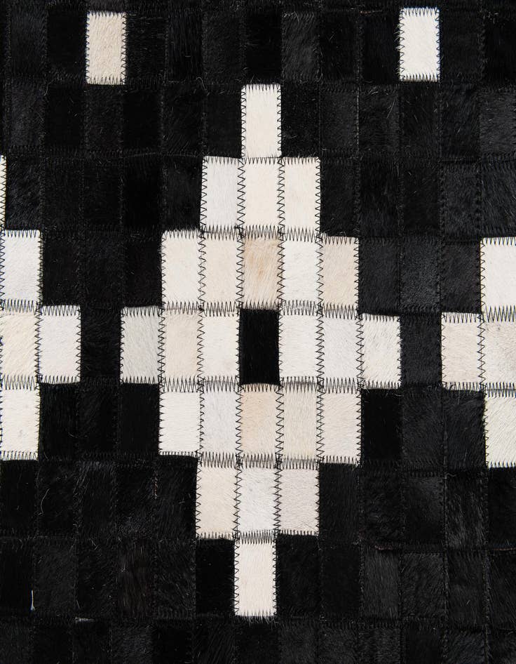 Detail image of  5' 1 x 7' 11 Cowhide Stocks Rug