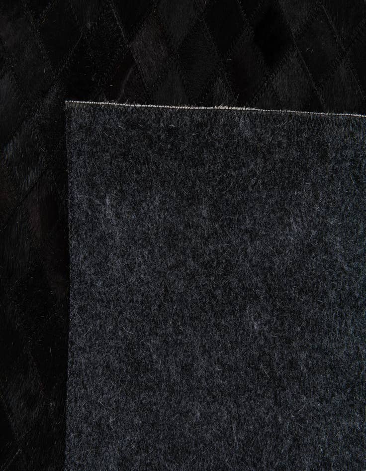 Detail image of  5' 1 x 7' 11 Cowhide Stocks Rug