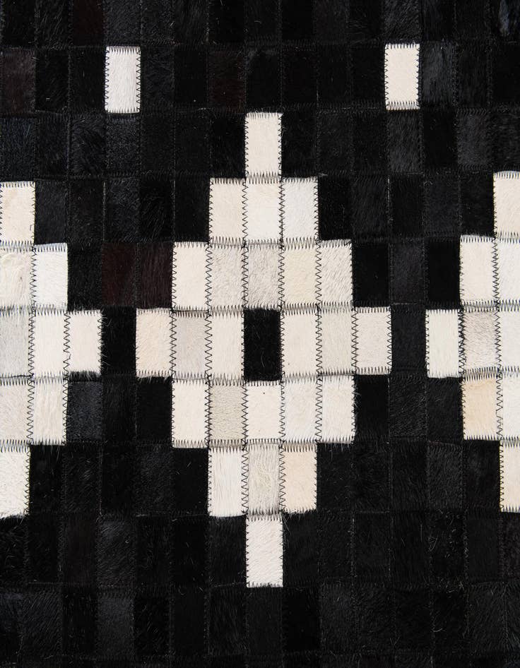 Detail image of  5' 2 x 8' Cowhide Stocks Rug