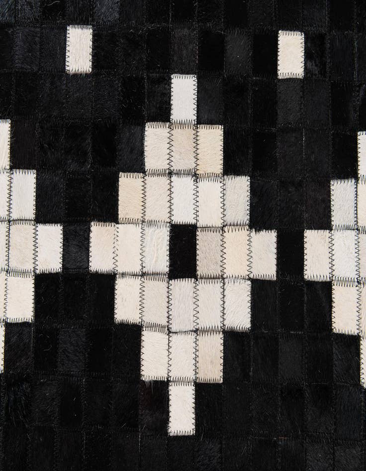 Detail image of  5' 2 x 8' Cowhide Stocks Rug