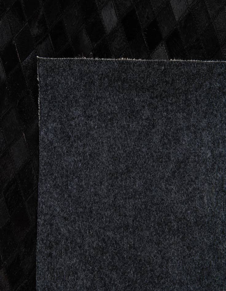 Detail image of  5' 2 x 8' Cowhide Stocks Rug