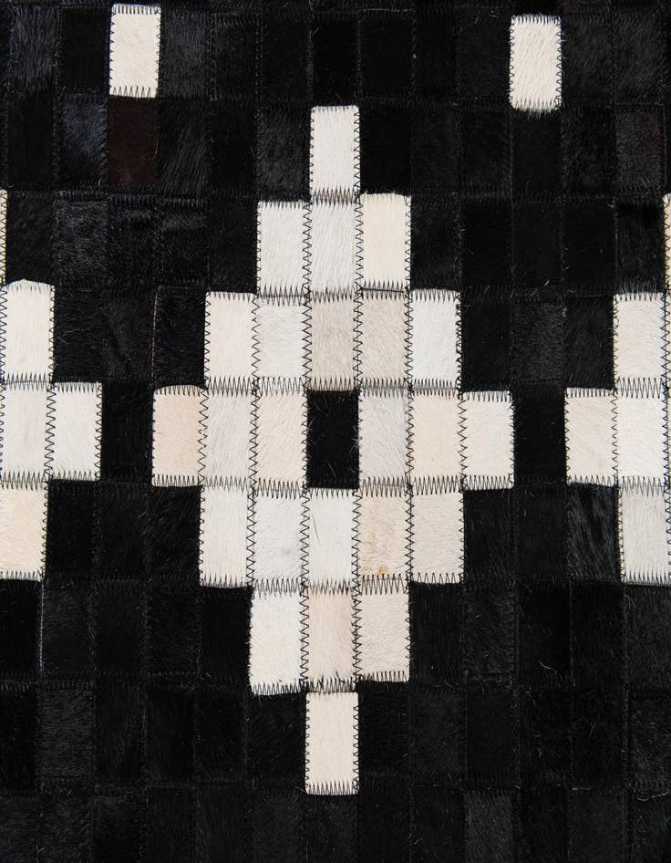 Detail image of  5' 2 x 8' Cowhide Stocks Rug