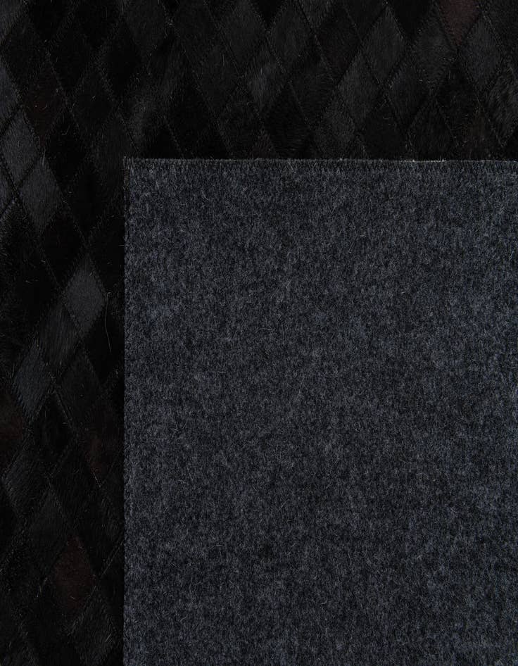 Detail image of  5' 2 x 8' Cowhide Stocks Rug