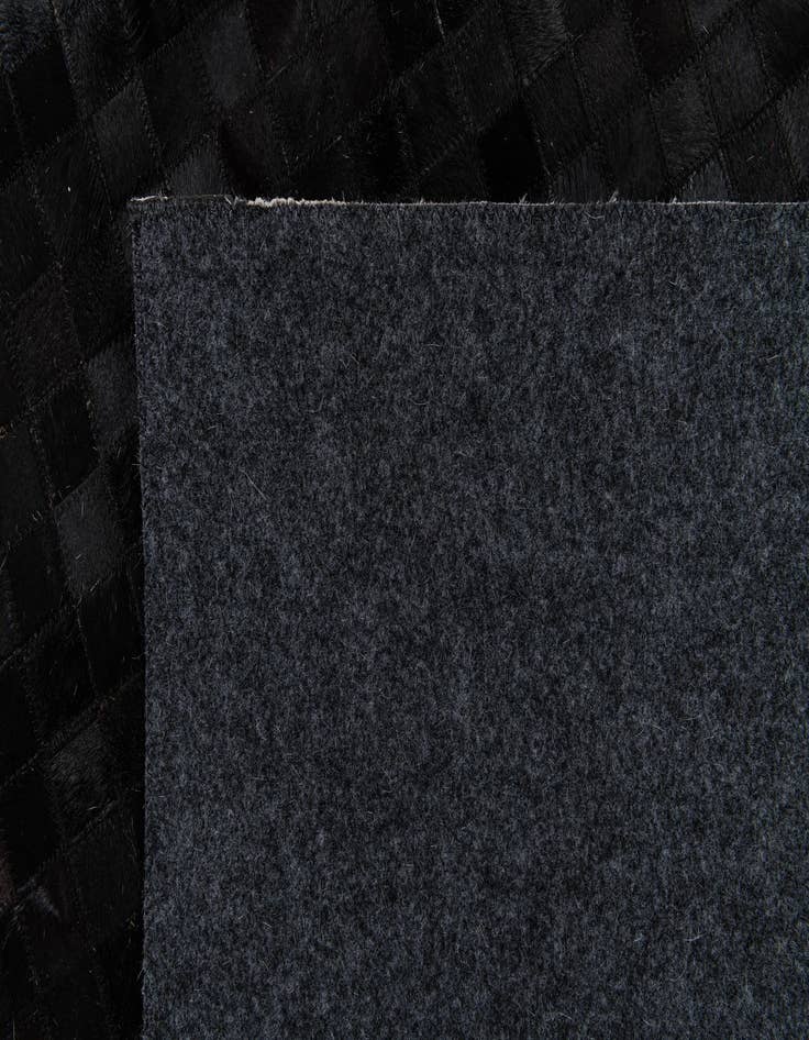 Detail image of  5' 1 x 7' 11 Cowhide Stocks Rug