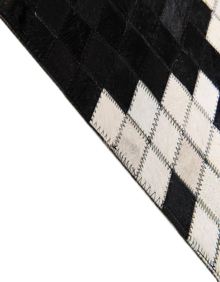 Detail image of  5' 2 x 8' 1 Cowhide Stocks Rug