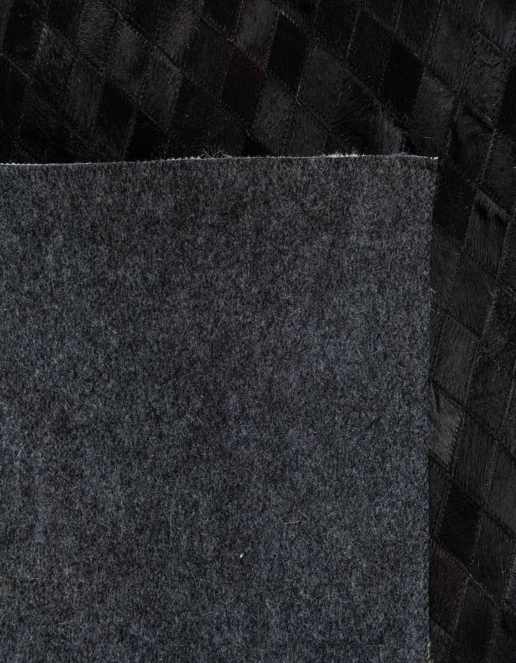 Detail image of  5' 2 x 8' 1 Cowhide Stocks Rug