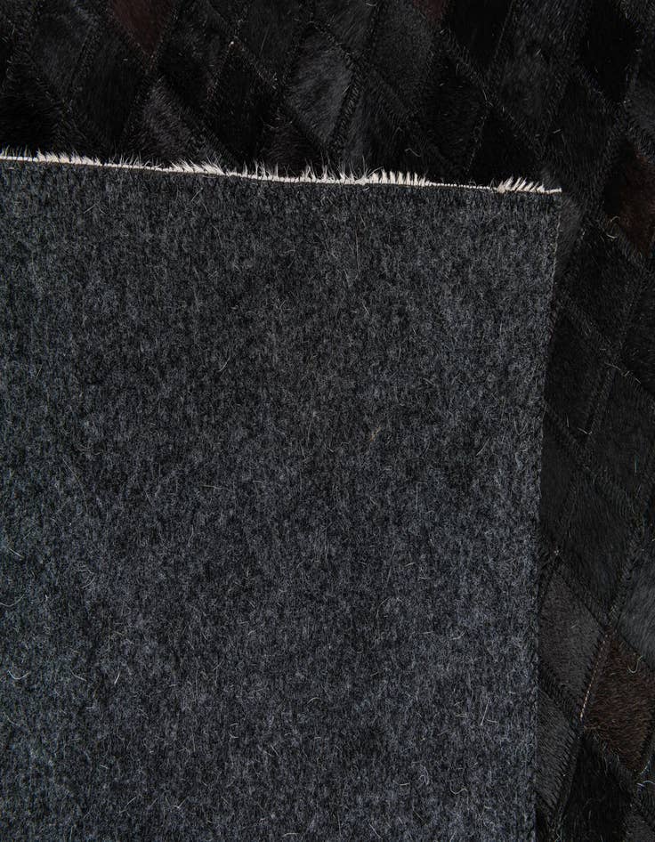 Detail image of  5' 3 x 8' 1 Cowhide Stocks Rug