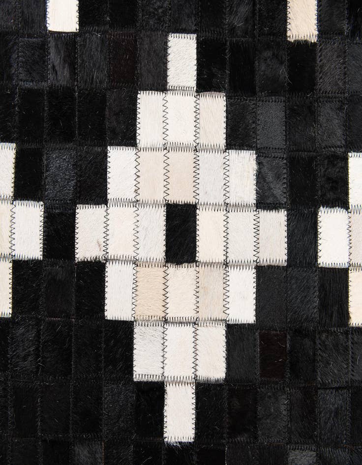 Detail image of  5' 1 x 8' Cowhide Stocks Rug