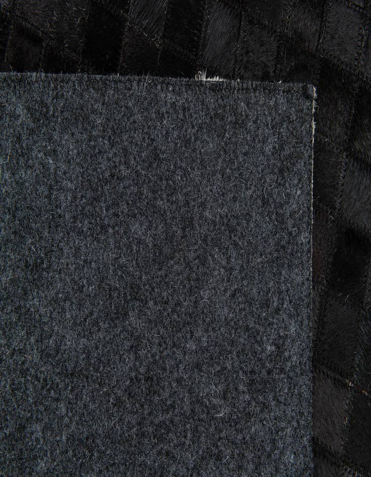 Detail image of  5' 1 x 8' Cowhide Stocks Rug