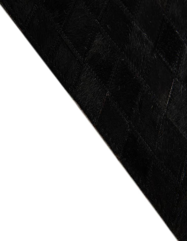 Detail image of  5' 2 x 8' Cowhide Stocks Rug