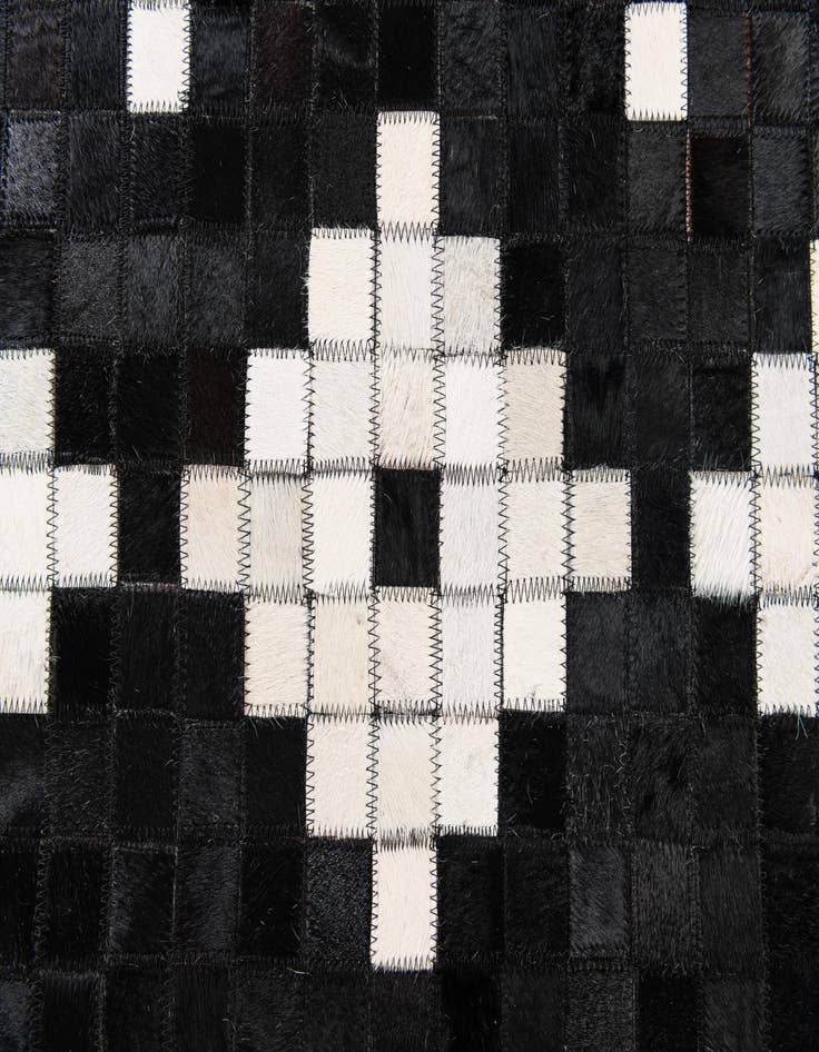 Detail image of  5' 2 x 8' Cowhide Stocks Rug