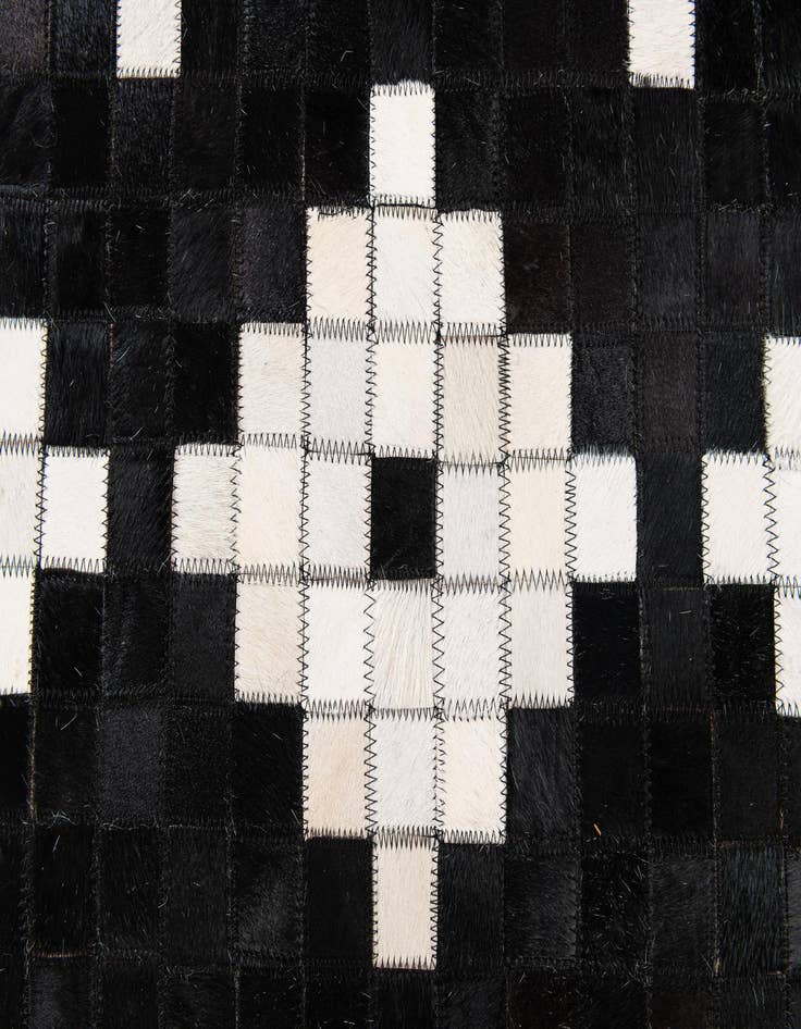 Detail image of  5' 2 x 8' 1 Cowhide Stocks Rug