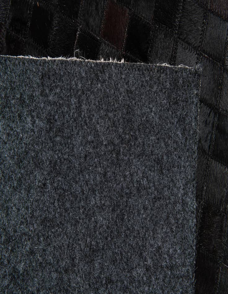 Detail image of  5' 2 x 8' 1 Cowhide Stocks Rug