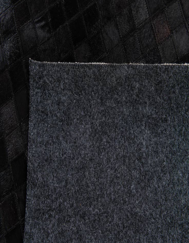 Detail image of  5' 2 x 8' Cowhide Stocks Rug