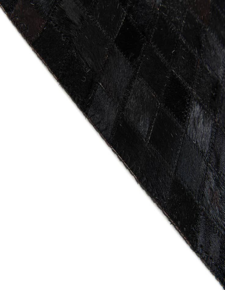 Detail image of  5' x 7' 11 Cowhide Stocks Rug