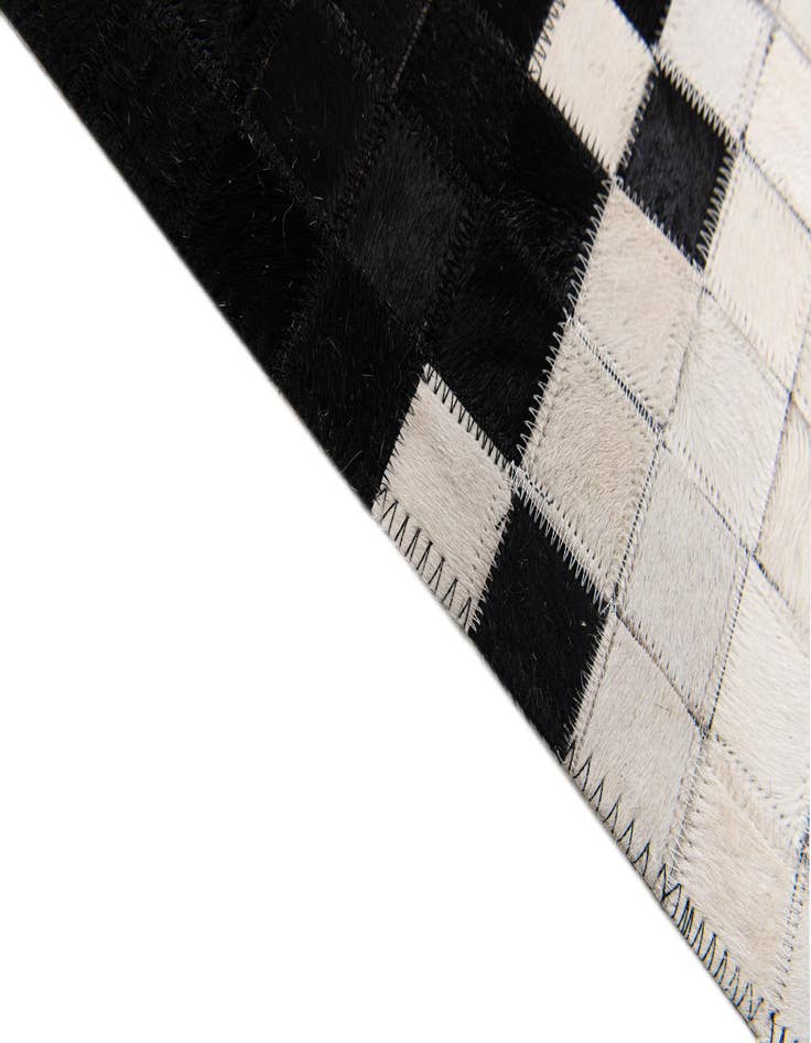 Detail image of  5' x 8' Cowhide Stocks Rug