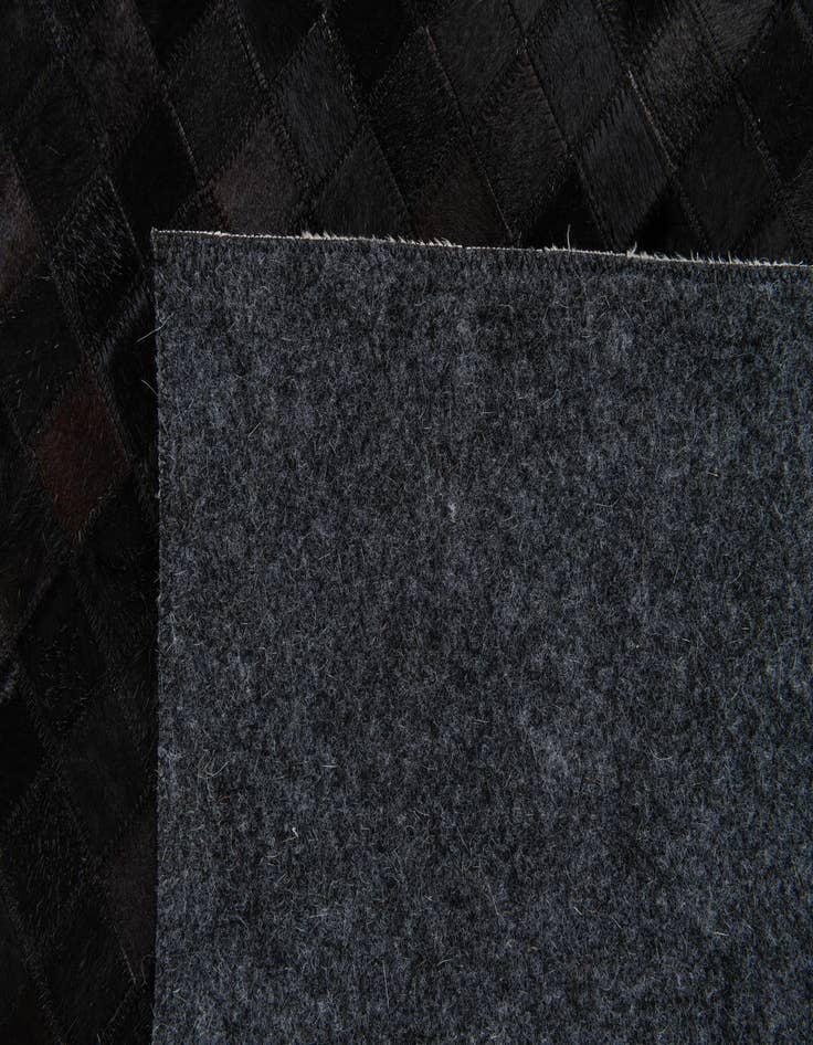 Detail image of  5' x 8' Cowhide Stocks Rug