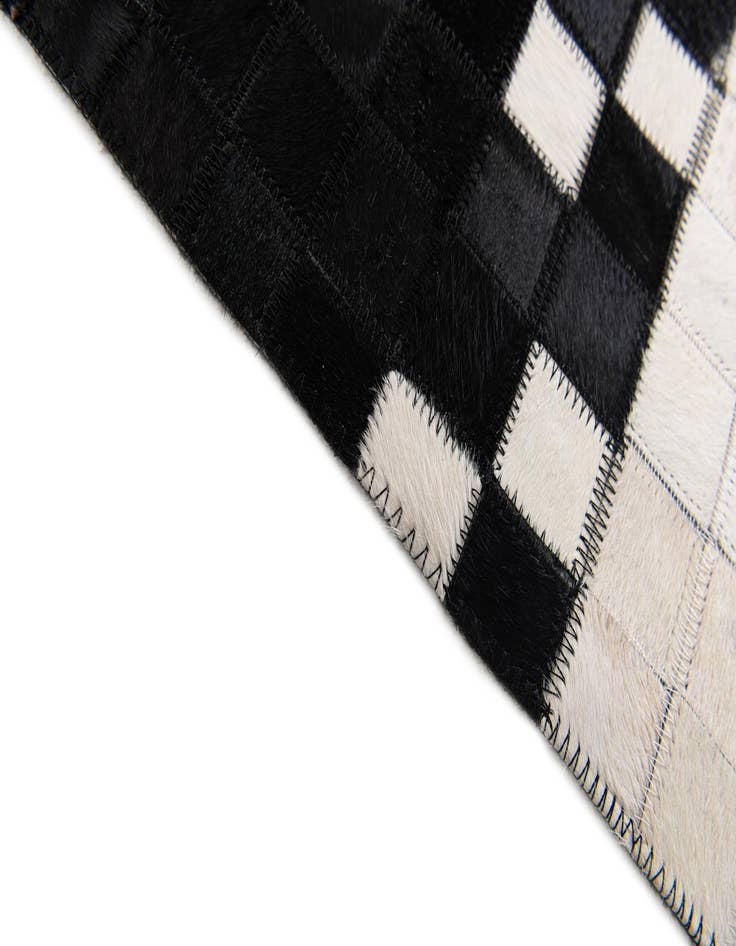 Detail image of  5' 1 x 8' 1 Cowhide Stocks Rug