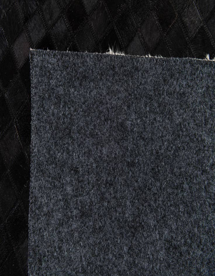 Detail image of  5' 1 x 8' 1 Cowhide Stocks Rug